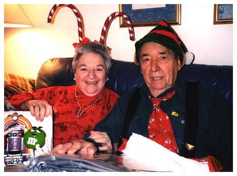 2005.. - Bianca, Rob - customary Christmas hats.jpg